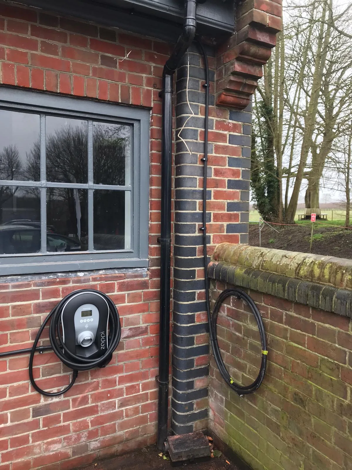 Three-phase EV charger installation by REST UK at a commercial building