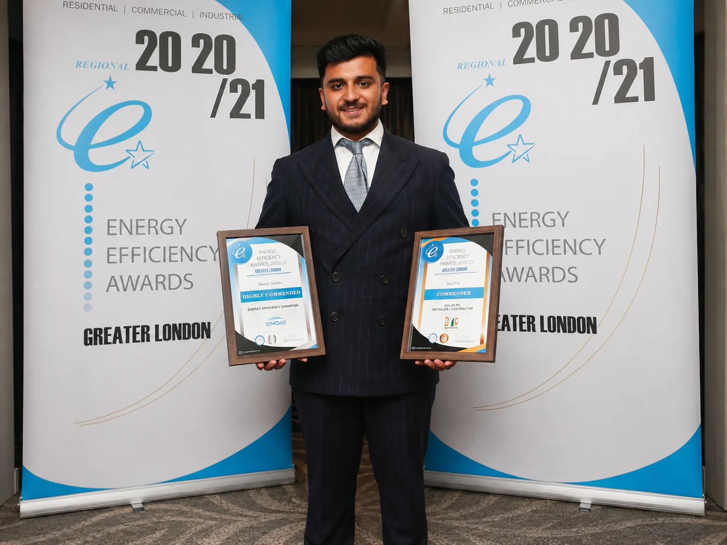 REST UK representative holding Energy Efficiency Awards