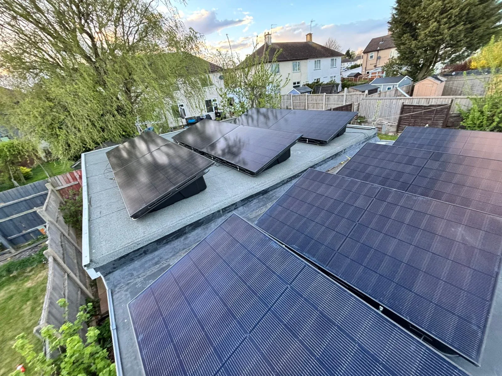 Rooftop solar panels in a UK suburb, representing Essex