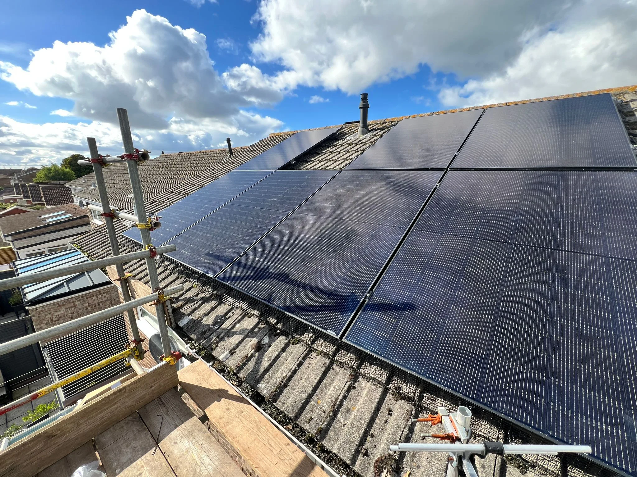 Solar panels on a residential roof, representing Bristol