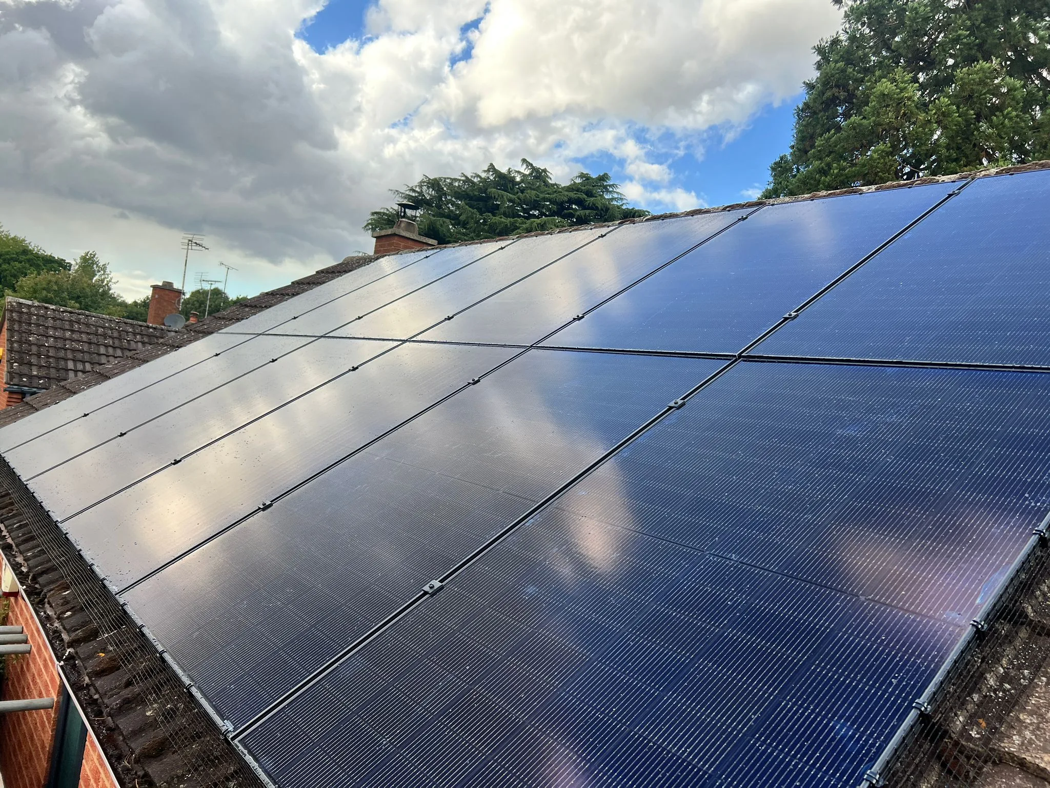 Solar panels on a roof, representing Sheffield